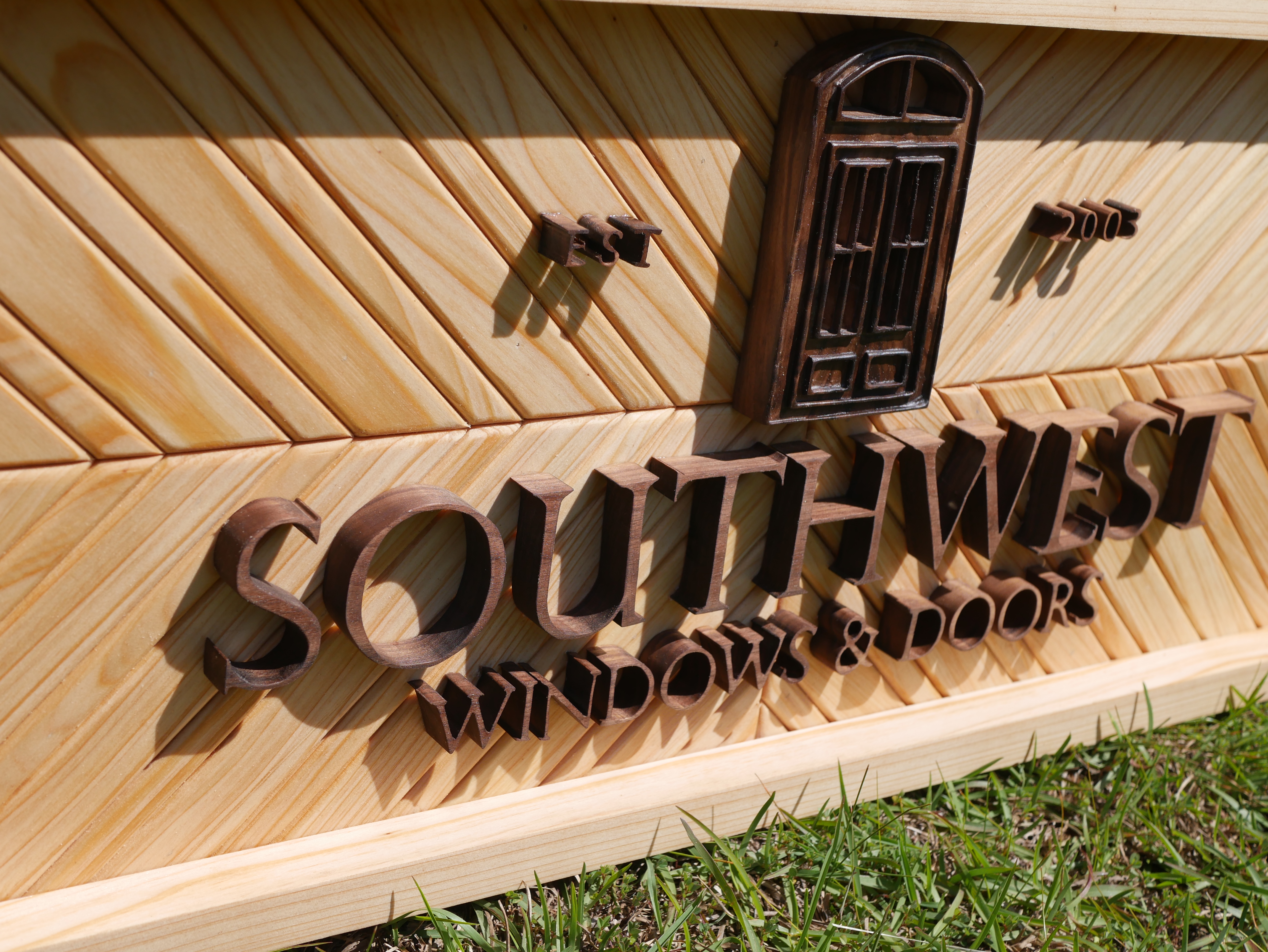 Custom wood business sign with raised lettering