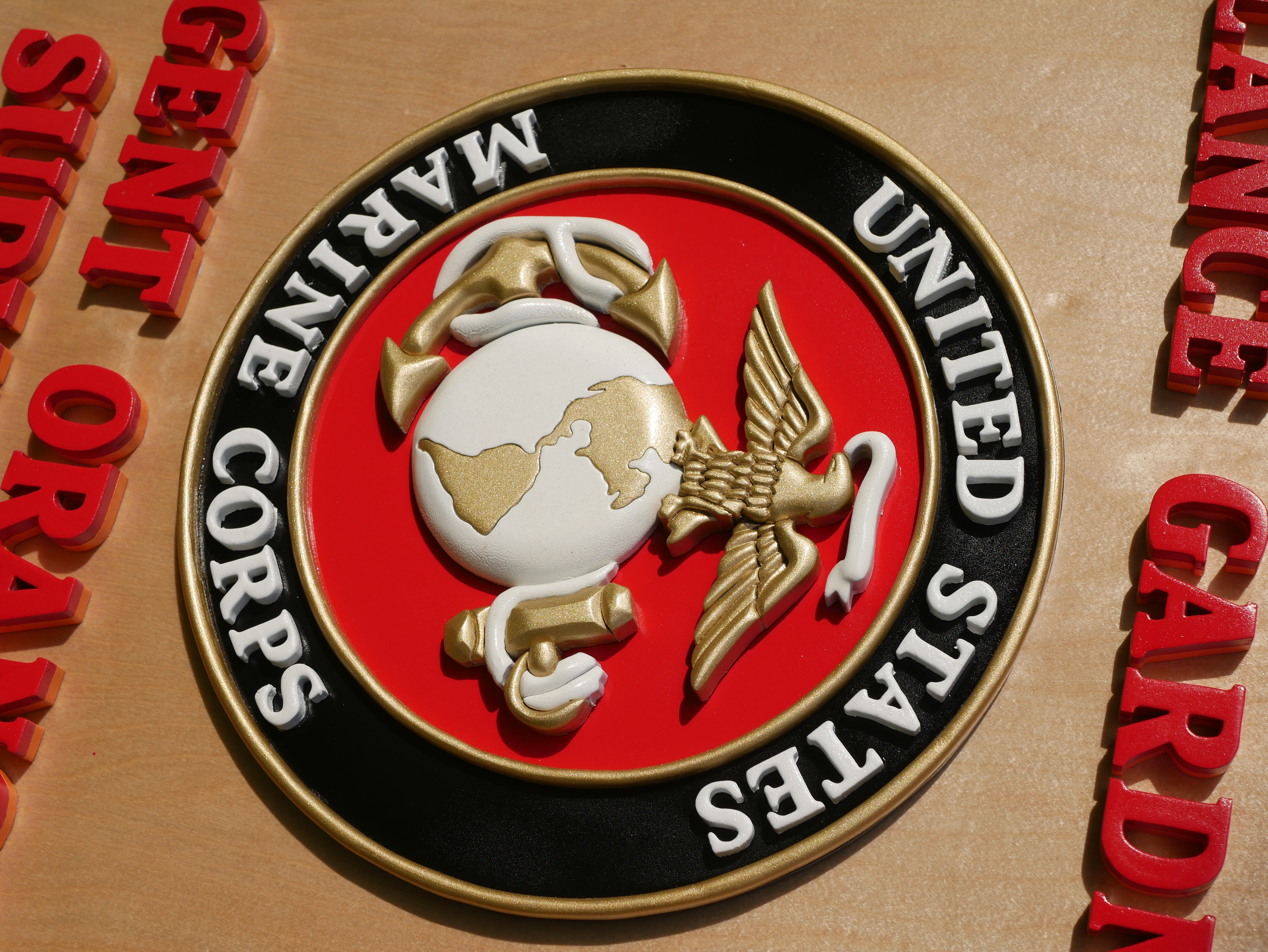 Close-up detail of custom Marine Corps logo sign