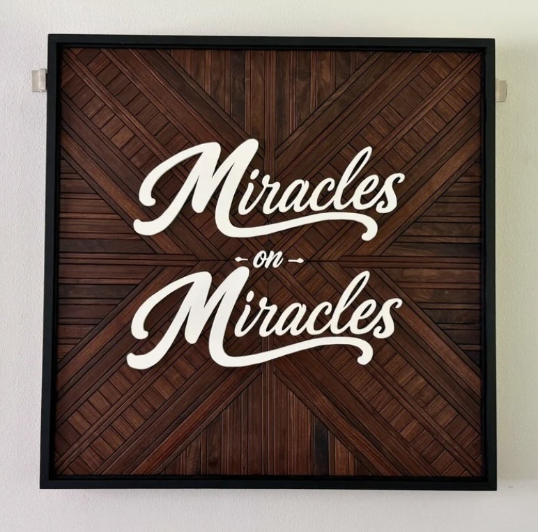 Miracles on Miracles custom wood mosaic sign with raised white lettering
