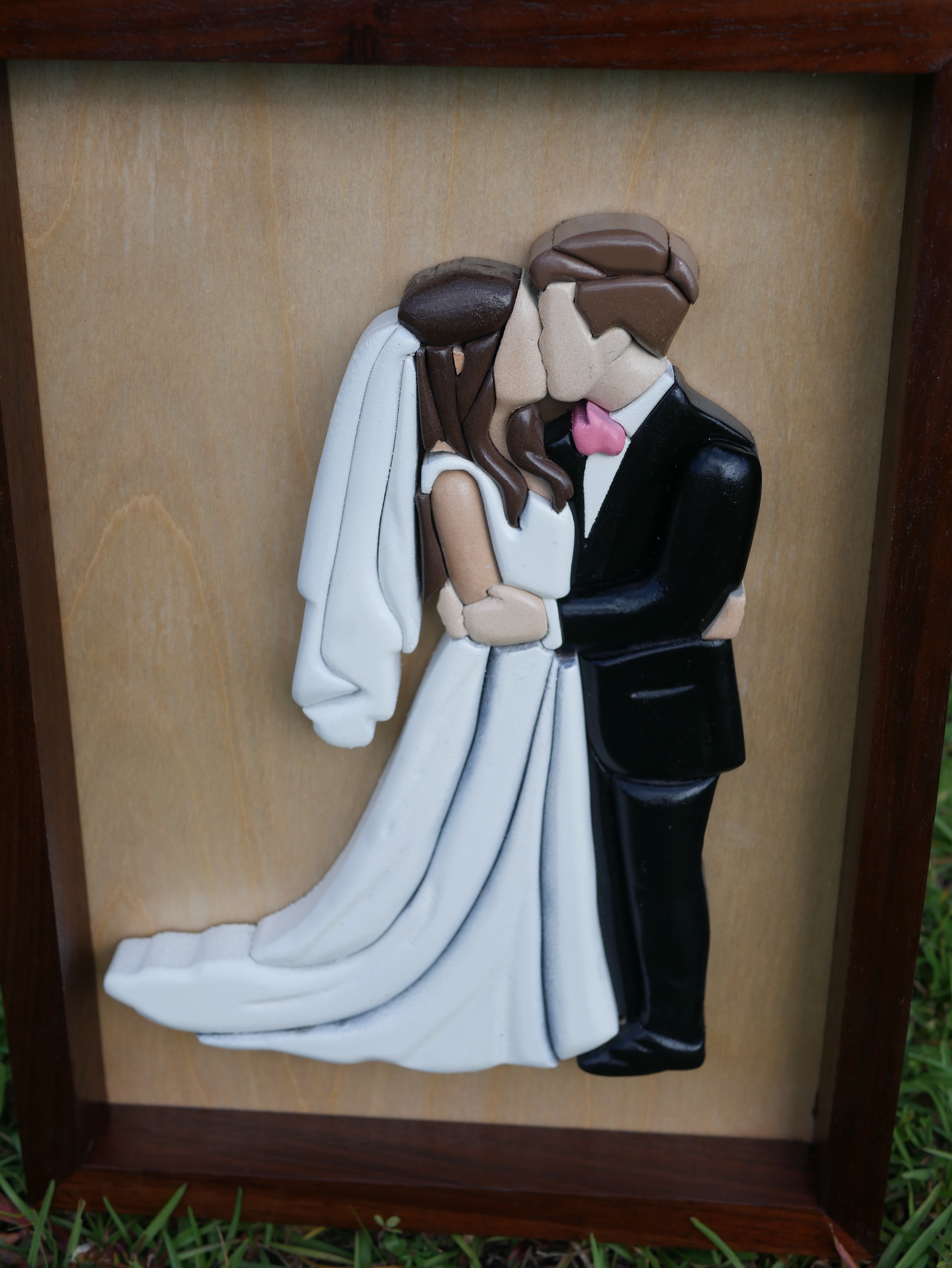 Custom wedding portrait made from layered wood pieces